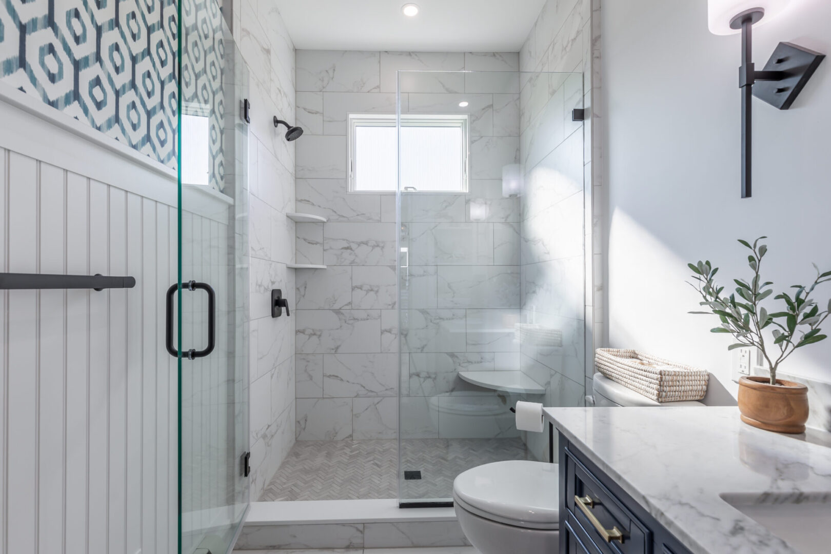 a shower area with white commode